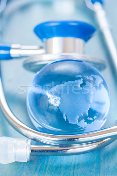 Stock photo: Stetoscope and glass globe