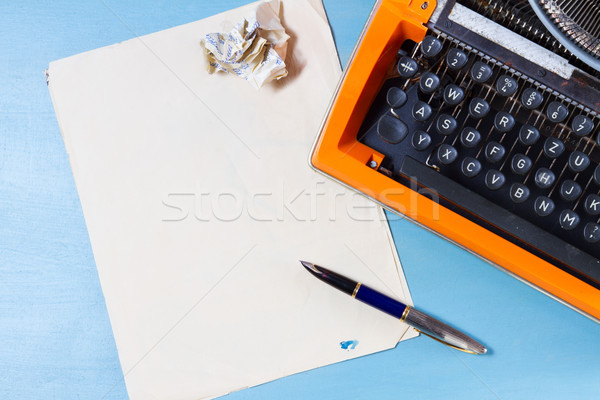 Munkaterület klasszikus narancs írógép üres papír Stock fotó © neirfy