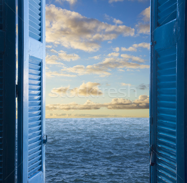 Сток-фото: комнату · открытых · дверей · морской · пейзаж · небе · воды · город