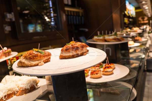 Traditional basque pinchos on a plate in restaurant Stock photo © Nejron