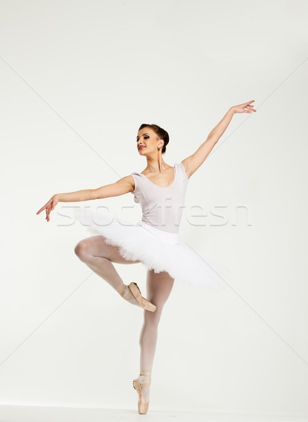 Young ballerina dancer in tutu showing her techniques  Stock photo © Nejron