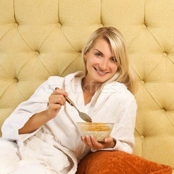Beautiful young woman has breakfast in bed Stock photo © Nejron