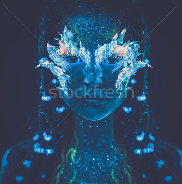 Portret piękna kobieta body art ultrafioletowy świetle Zdjęcia stock © Nejron