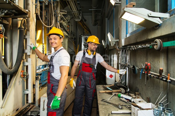 工人    安全    工厂 / two worker in   safety hats  on   factory