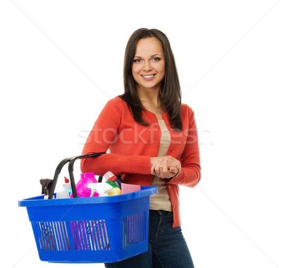 Beautiful cheerful brunette woman with basket full of cleansers  Stock photo © Nejron