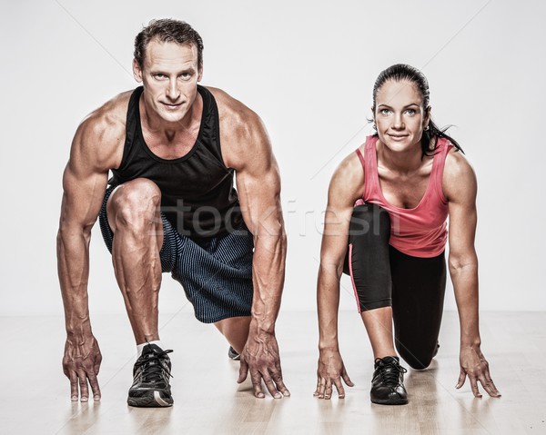 Atletisch man vrouw fitness oefening sport Stockfoto © Nejron