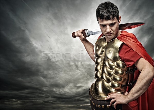 Legionary soldier over stormy sky Stock photo © Nejron