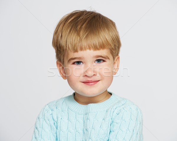 Smiling baby boy in blue pullover portrait Stock photo © Nejron