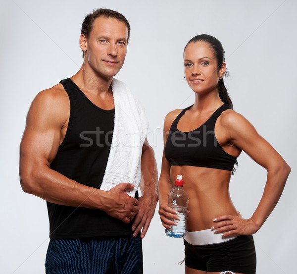 Athletic man and woman after fitness exercise Stock photo © Nejron