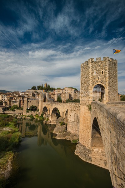 Ancient romanesque bridge over river, Besalu Stock photo © Nejron