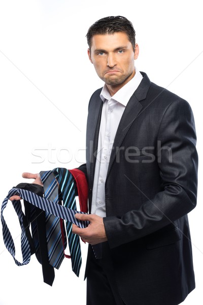 Bewildered handsome man in black suit and choice of ties  Stock photo © Nejron
