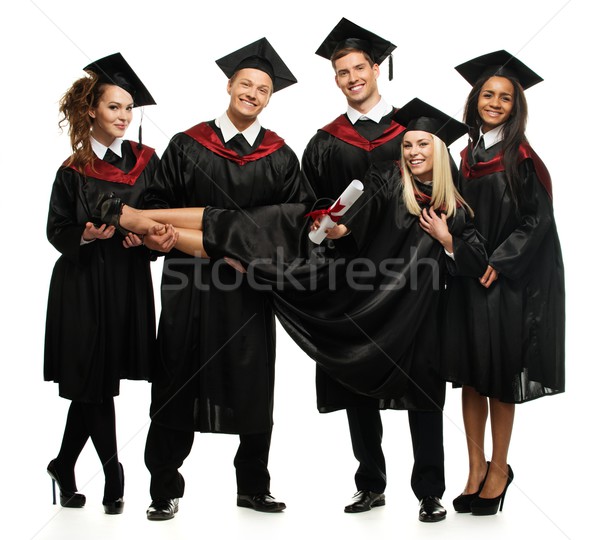 Multi ethnic group of graduated young students isolated on white Stock photo © Nejron