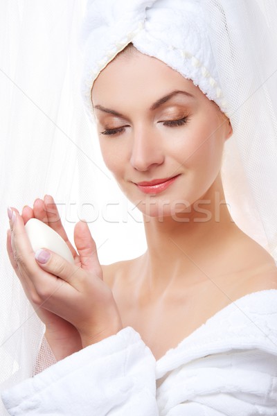 Beautiful woman after shower holding a soap Stock photo © Nejron