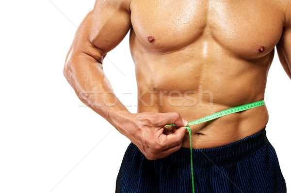 Man measuring his waistline. Stock photo © Nejron