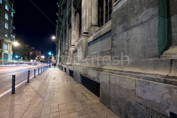 Street of Barcelona at night wtih blurred cars Stock photo © Nejron