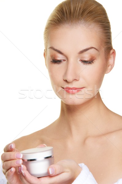 Beautiful woman with bottle of cream Stock photo © Nejron