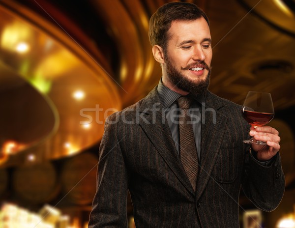 Przystojny człowiek kurtka szkła napój restauracji Zdjęcia stock © Nejron