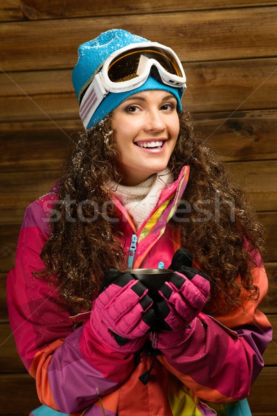 Feliz mulher esquiar desgaste copo bebida quente Foto stock © Nejron
