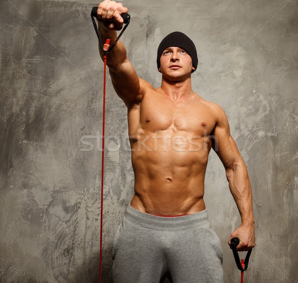 Yakışıklı adam kaslı vücut uygunluk egzersiz sağlık spor salonu Stok fotoğraf © Nejron