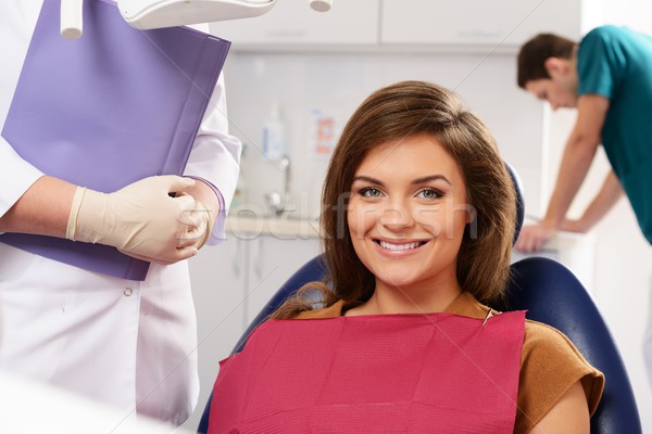 Young beautiful brunette woman at dentist's surgery Stock photo © Nejron