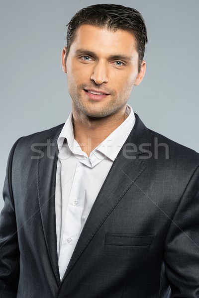 Knappe man zwart pak witte shirt business glimlach Stockfoto © Nejron