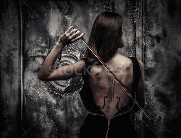 Femme robe violon art corporel arc Photo stock © Nejron