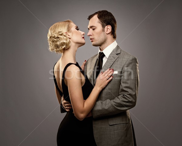 Retro couple on grey background. Stock photo © Nejron