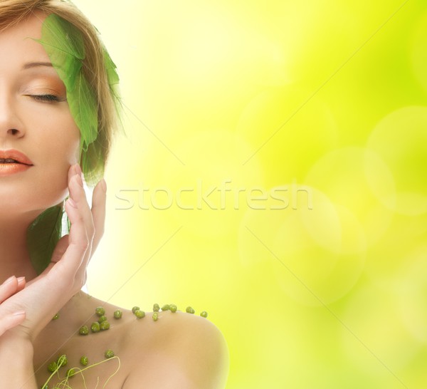 Dreaming young woman in conceptual spring costume  Stock photo © Nejron