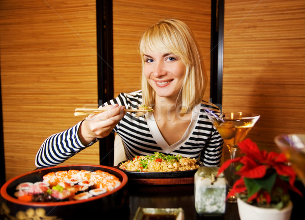 Beutiful blond girl in japanese restaurant Stock photo © Nejron