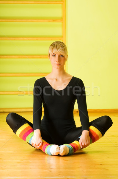 Stock photo: Beautiful ballet dancer relaxing after exercise