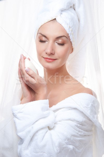 Beautiful woman after shower holding a soap Stock photo © Nejron