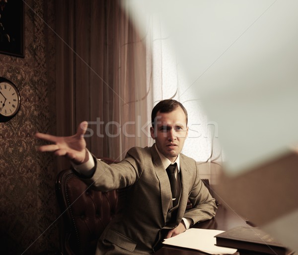 Angry businessman throwing a documents Stock photo © Nejron