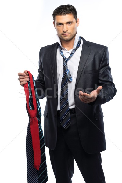 Bewildered handsome man in black suit and choice of ties  Stock photo © Nejron