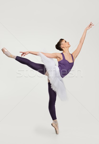 Young ballerina dancer in tutu showing her techniques  Stock photo © Nejron