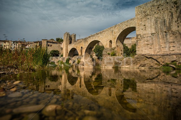 Romanesque bridge over river, Besalu Stock photo © Nejron