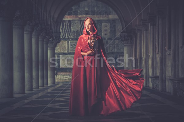 Nő maszk visel piros köpeny szabadtér Stock fotó © Nejron