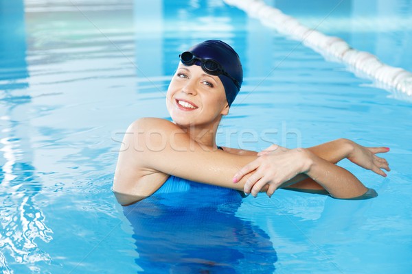 Jeune femme bleu natation costume chapeau [[stock_photo]] © Nejron