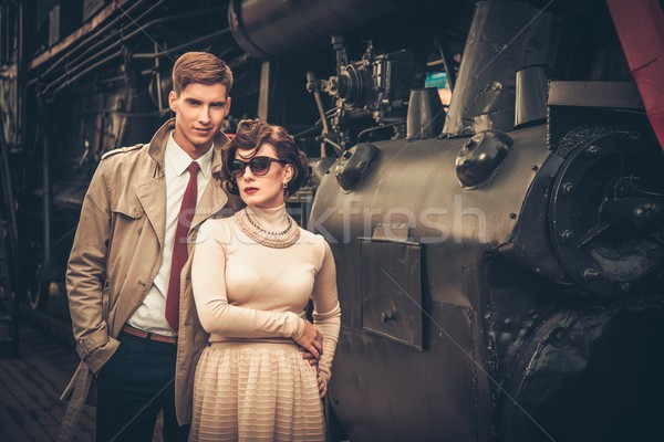 Vintage estilo casal mulher trem Foto stock © Nejron