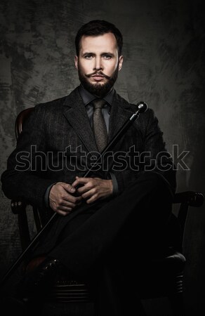 Handsome well-dressed  sitting in leather chair   Stock photo © Nejron