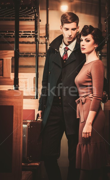 Vintage style couple inside retro train coach  Stock photo © Nejron