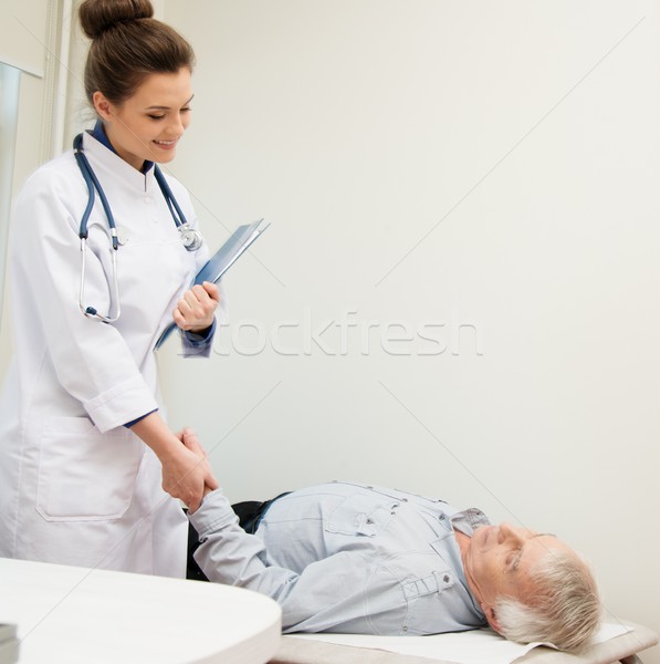 Senior man lying at daybed at doctor's office Stock photo © Nejron
