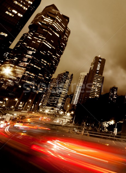 Fast moving cars at night Stock photo © Nejron