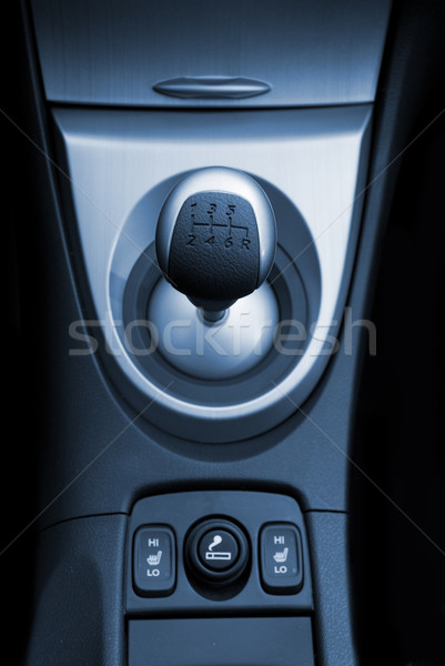 Six speed gear stick in a brand new sport car (toned in blue) Stock photo © Nejron