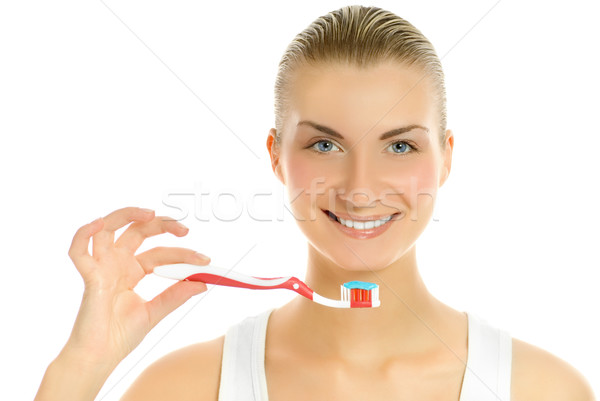 Mooie jonge vrouw tandenborstel geïsoleerd witte meisje Stockfoto © Nejron
