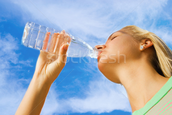 Beautiful girl drinking water Stock photo © Nejron