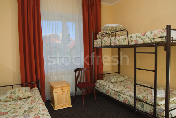 Stock photo: Hostel room with city view