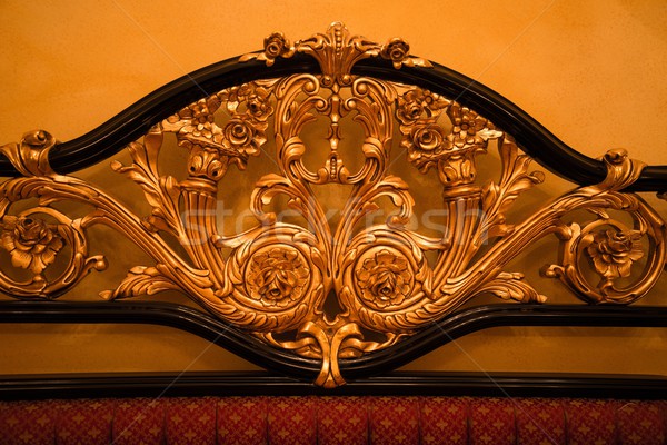 Back of expensive sofa with golden ornament Stock photo © Nejron
