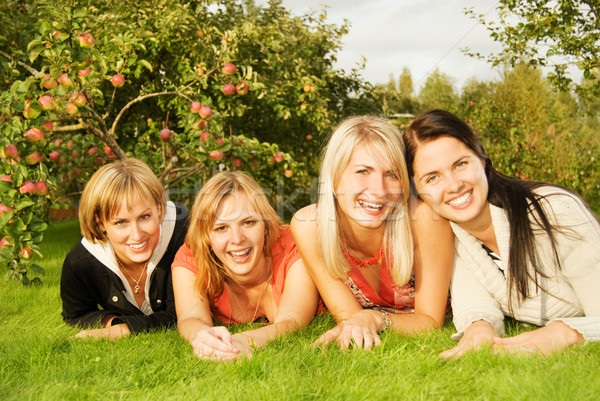 Group of happy friends having fun outdoors Stock photo © Nejron