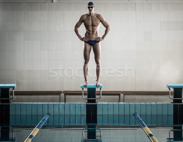 Jungen muskuläre Schwimmer stehen Schwimmbad Mann Stock foto © Nejron