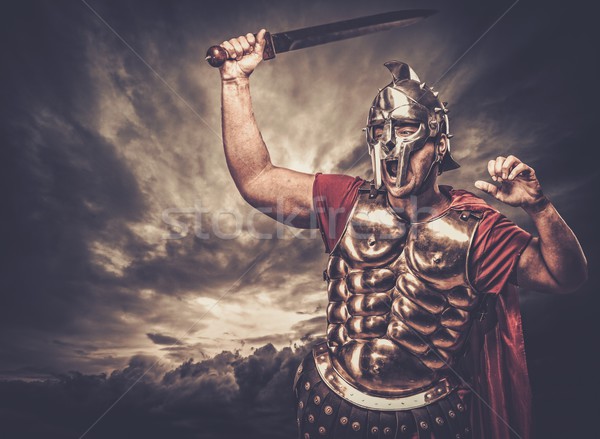 Legionary soldier against stormy sky Stock photo © Nejron